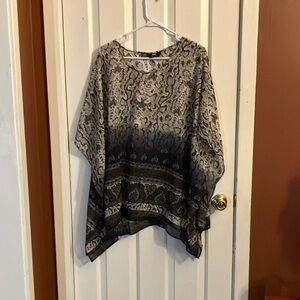 Size 24 women’s never been worn brand new snake print, beautiful fabric quality